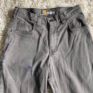 Sorry for my terrible pics but mens Carhartt pants. brown/gray. Size is 28 x 32.